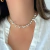 Colar Choker Corações Madrepérola e Zircônias Banhado a Ouro