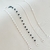 Pulseira Pedrinhas Pretas Banhada a Prata - comprar online