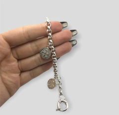 PU-ROLO BENITO Pulsera Con Dijes San Benito Reversibles Plata 925 en internet