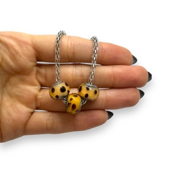 TINI-32 Pulsera 3 Donas Animal Print Acero Quirúrgico