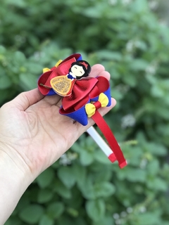 Laço/Tiara Branca de Neve na internet