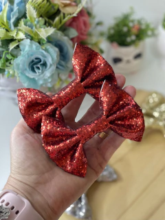 Laços em glitter na cor vermelho
