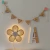 Luminária de Parede Flor com Palhinha na internet