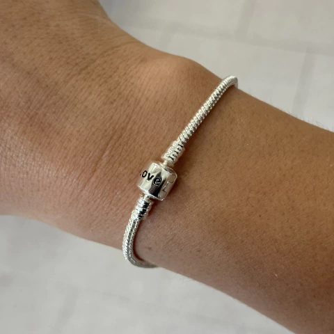 Pulsera love pandora acero blanco
