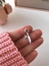 DIJE PLUMA CON ESTRELLA