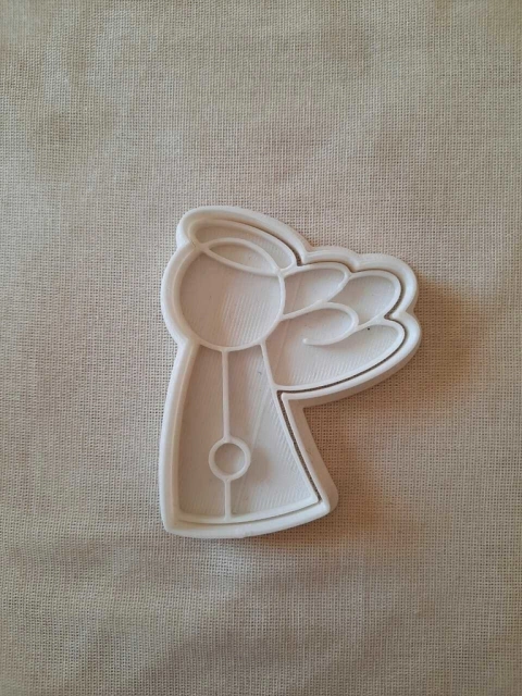 Angelito de costado de 7x9cm.