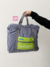 BOLSO DE MANO PLANE