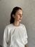 Buzo Hostilidad off white en internet
