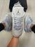 Nike Air Jordan 4 Cinza/Off White na internet