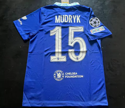 Camiseta Nike Chelsea Titular Mudryk 18 2022 2023 UCL Parche Campeon