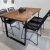 MESA INDUSTRIAL LAQUEADA CON SILLAS TULUM