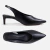 Scarpin sligback high vamp preto com design elegante e moderno, ideais para diversas ocasiões e looks sofisticados.
