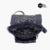 Vista interior de una cartera-bandolera-mochila de mujer Bilbao Max en color azul, con compartimentos y detalles en malla.