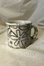 Taza pintada - negra en internet