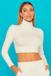 BLUSA SWISS CROPPED GOLA ALTA OFF WHITE