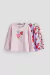 Camiseta blanca con corazones