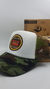 Gorra De Autor The Cap BEER LINE "Four Pack Pilsen" Trucker Sublimado Blanco y Verde Camuflado