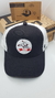 Gorra De Autor The Cap FEMME LINE "BANG" Negro y Blanco - comprar online