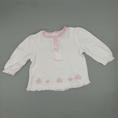Remera Lu Talle 3 meses blanca con lunares rosas y florcitas bordadas