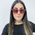 Óculos maby pink neon na internet