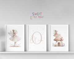 Conjunto de quadros infantis com ilustrações de uma fada e um cogumelo, decorando um ambiente infantil.