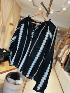 Blusa Faning en internet