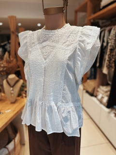 Blusa Doss en internet