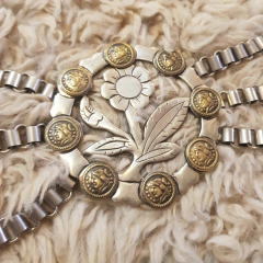 Rastra flor de cardo con bronce