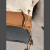 ALMOHADON NIDO CON TIRADOR DE CUERO - comprar online