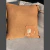 ALMOHADON NIDO CON TIRADOR DE CUERO en internet