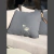ALMOHADON NIDO CON TIRADOR DE CUERO