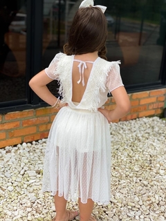 Conjunto Branco Tule com Franja (Blusa + Saia com Short + Laço de Cabelo) na internet