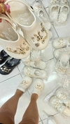 CROCS BOTTONS