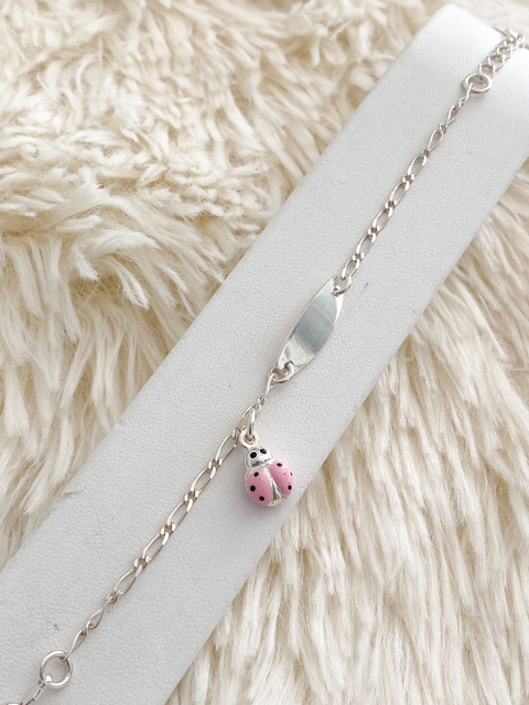 PULSERA IDENTIDAD PLATA PARA BEBE CON DIJE VAQUITA DE SAN ANTONIO