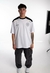 REMERA OVER CONCRETE STUDIO BLANCA M/NEGRA SIGNOS