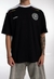 REMERA OVER CONCRETE STUDIO NEGRO M/BLANCA SIGNOS
