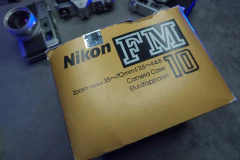 Nikon FM10 con Nikkor 35-70mm f3,5-4,8 en caja original - tienda online