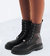 BORCEGO ACORDONADO CUERO NEGRO
