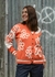 Imagen de CARDIGAN FLOR NARANJA