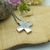 COLLAR CRUZ DEL EQUILIBRIO CON SAN BENITO