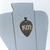 COLLAR PÚA CON BANDA KISS en internet