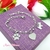 PULSERA DOBLE PERRITO ROSA