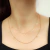 COLLAR TRIÁNGULOS ACERO DORADO - comprar online