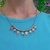 COLLAR OCHO HIJOS Y BOLITAS