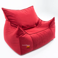 Fiaca DUBAI de la línea Pana en color rojo, con un diseño moderno y confortable, el sillón ideal para relajarse. 