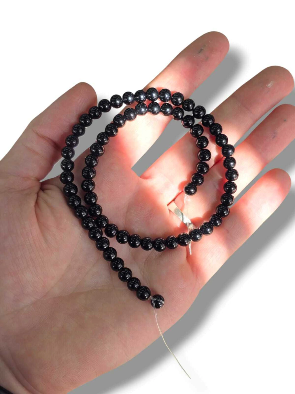 Tira piedras obsidiana negra N6