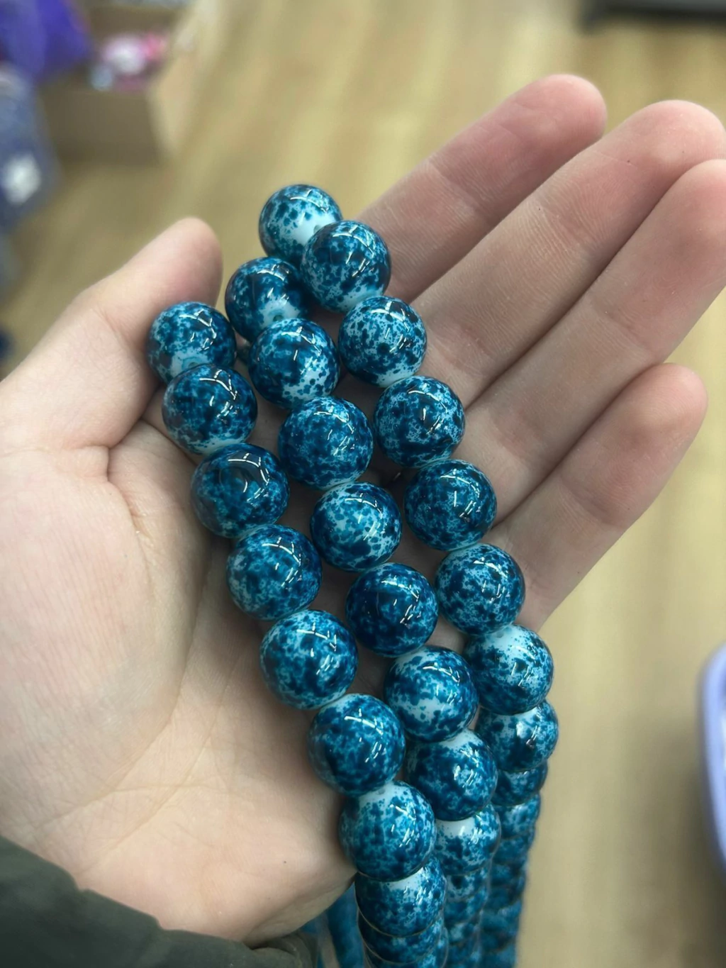 Tira de perla vidrio marmoleado azul oscuro 14mm (aprox 70cm de largo)