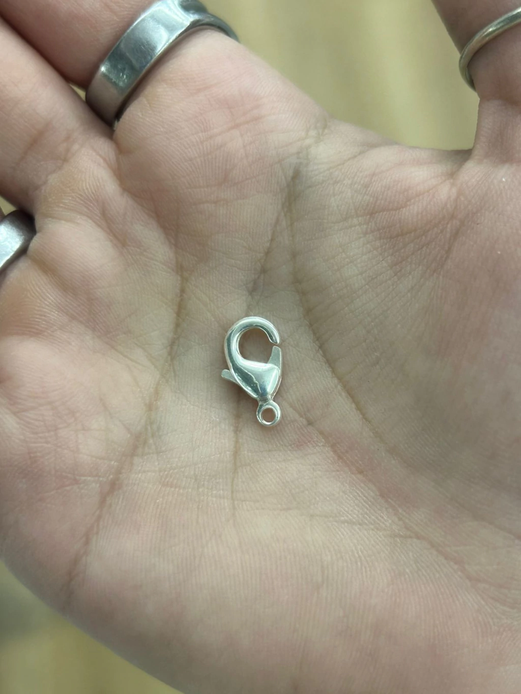 Mosqueton de acero quirurgico blanco 15mm