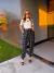CONJUNTO BLUSA COM DETALHE FRONTAL E CALÇA na internet