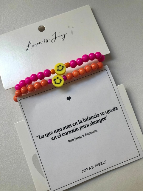 Set PULSERAS CARITA NARANJA & FUCSIA